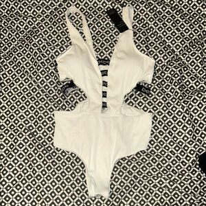 Bebe White and Black One Piece Swimsuit with Modern Cut-Outs